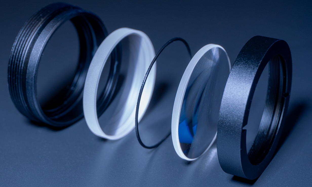 Birefringent crystal optical component used in specialized optical systems